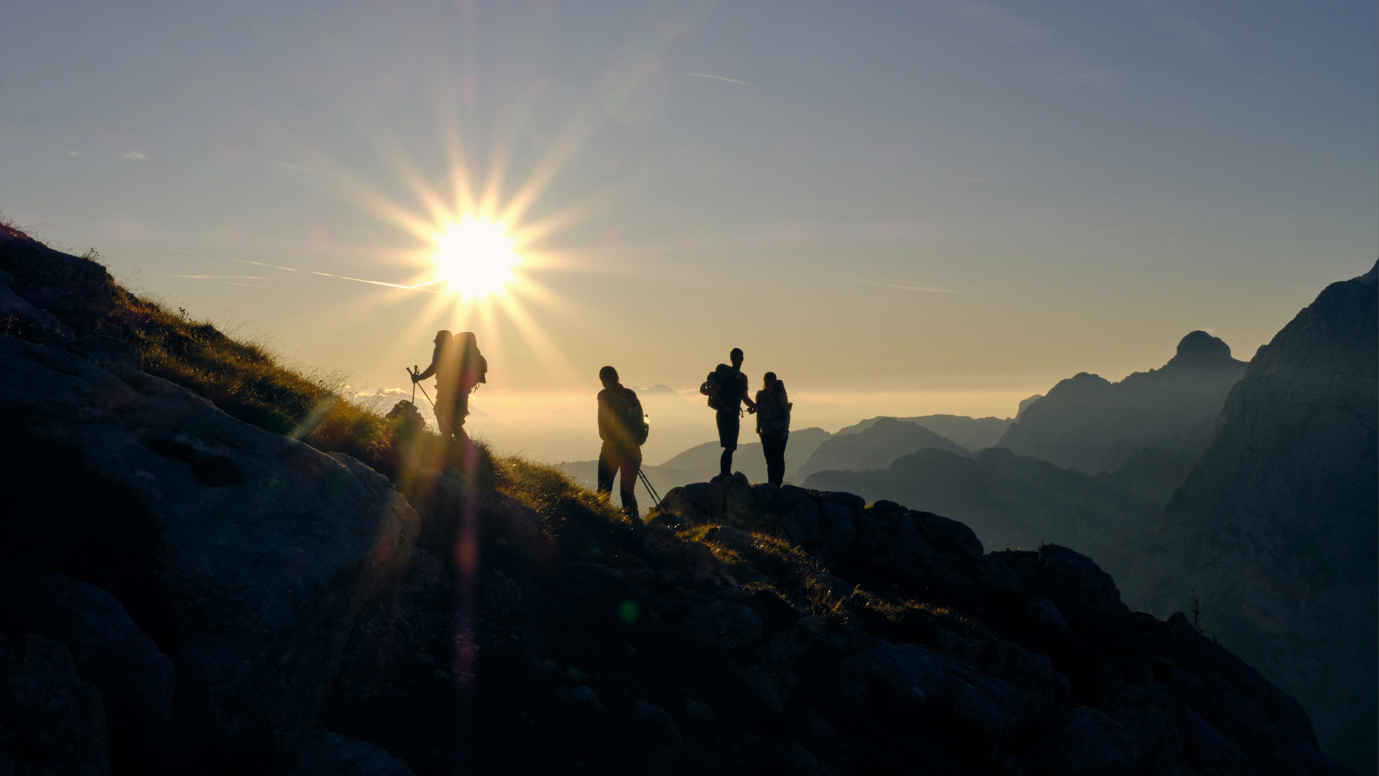Group of travelers hiking a mountain
